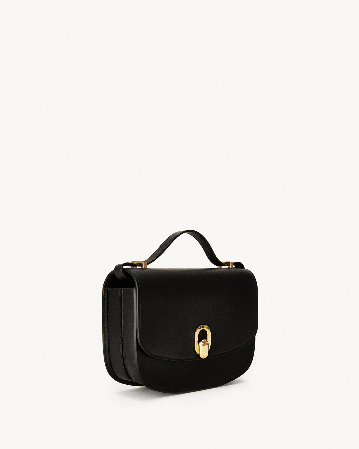 side view of a black leather bag with gold hardware on a white background