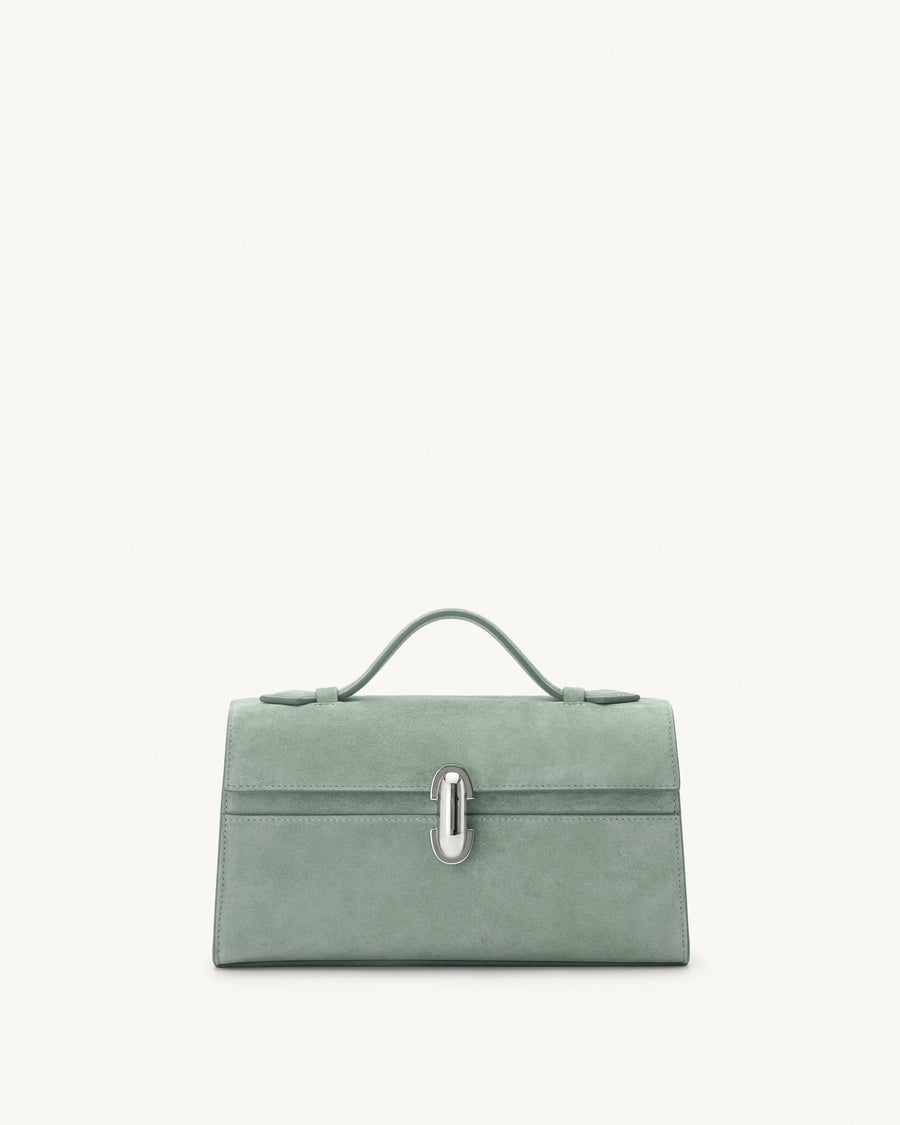 front view of mist green suede bag with silver clasp on a white background