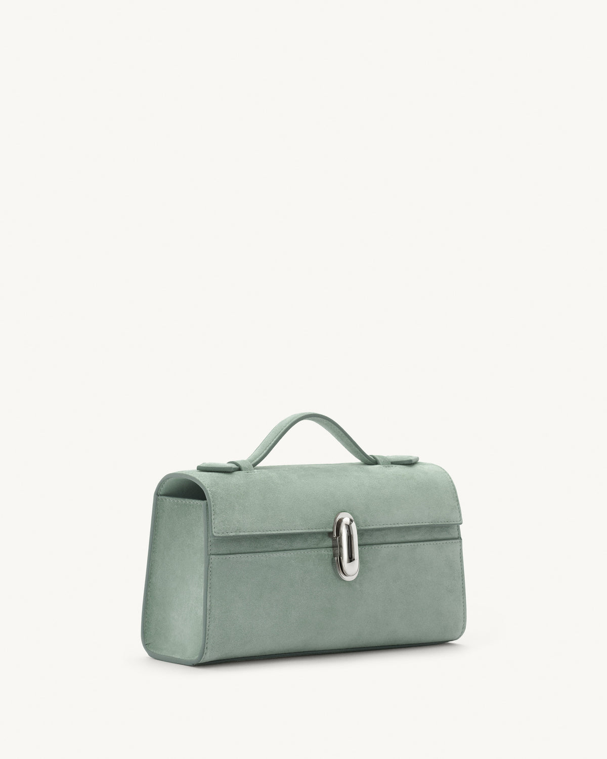 side view of mist green suede bag with silver clasp on a white background