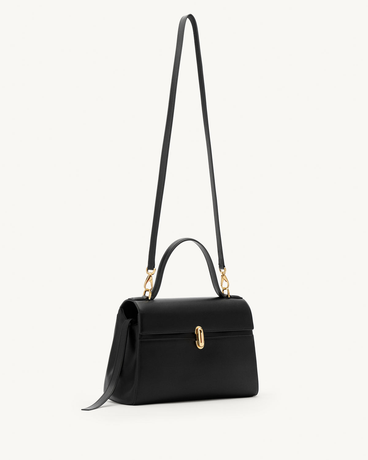 side view of a black leather handbag with gold clasp on a white background 