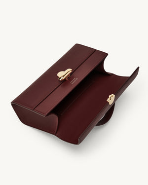 Symmetry Pochette in Wine Leather