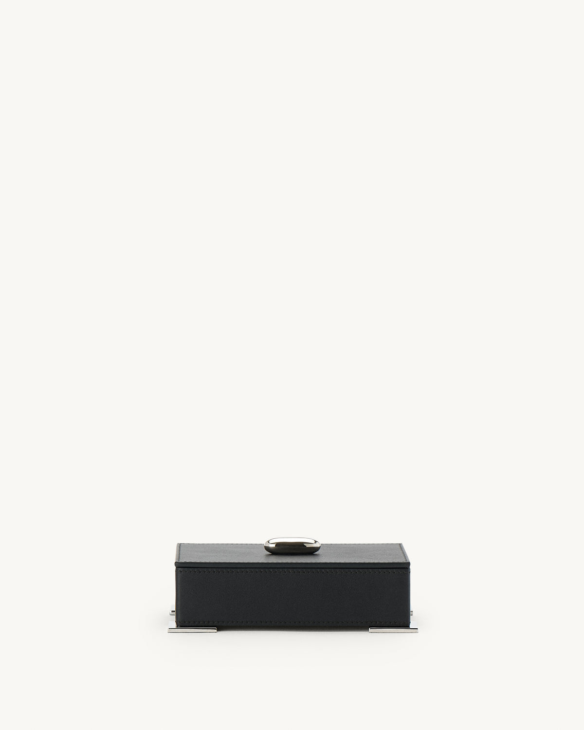 front view of a an ebony black leather box with silver hardware  on a white background