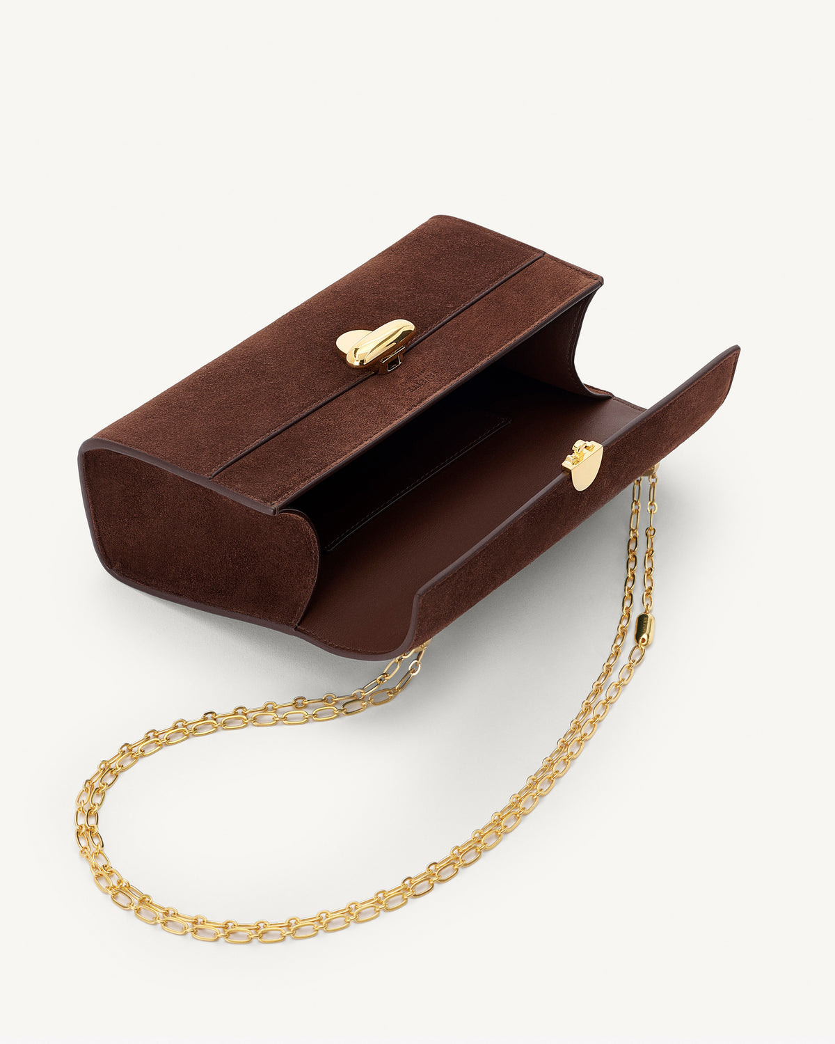 interior view of espresso brown suede bag with gold clasp and gold chain on a white background