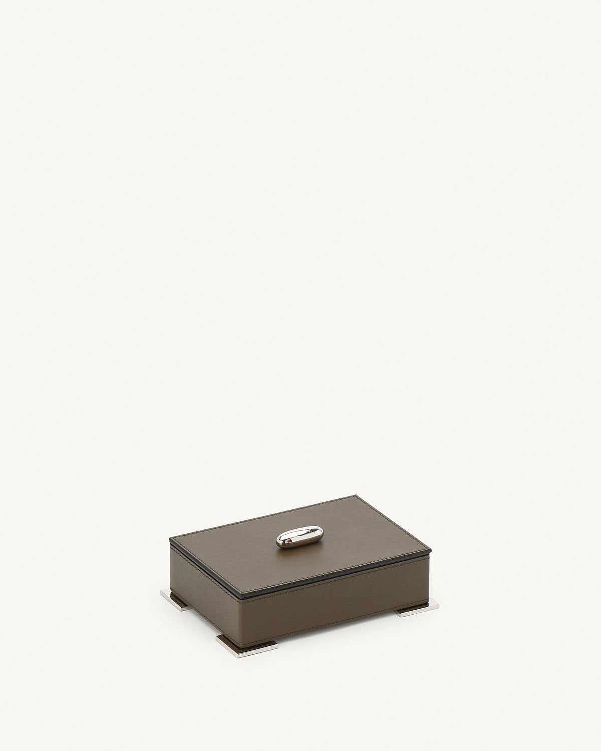 side view of a mink brown leather box with silver hardware on a white background