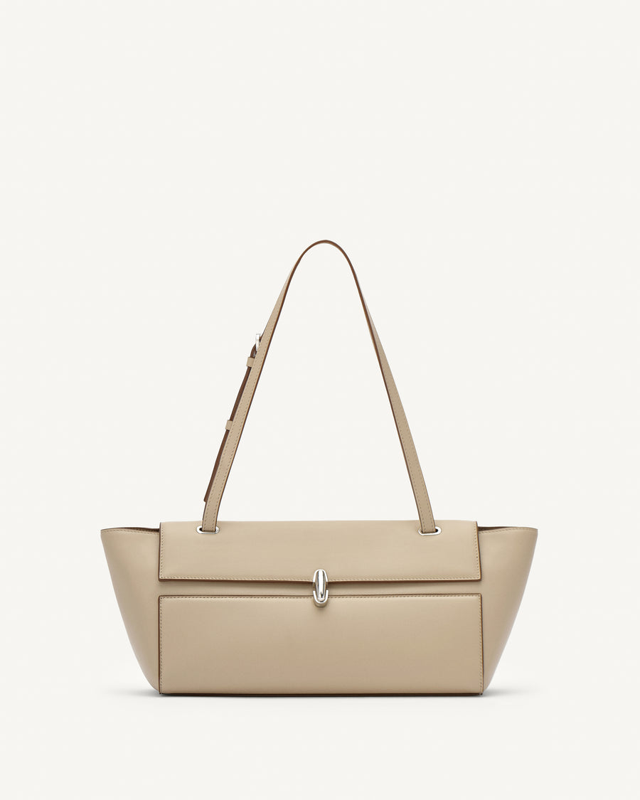 front view of a bone beige leather bag with a silver clasp on a white background