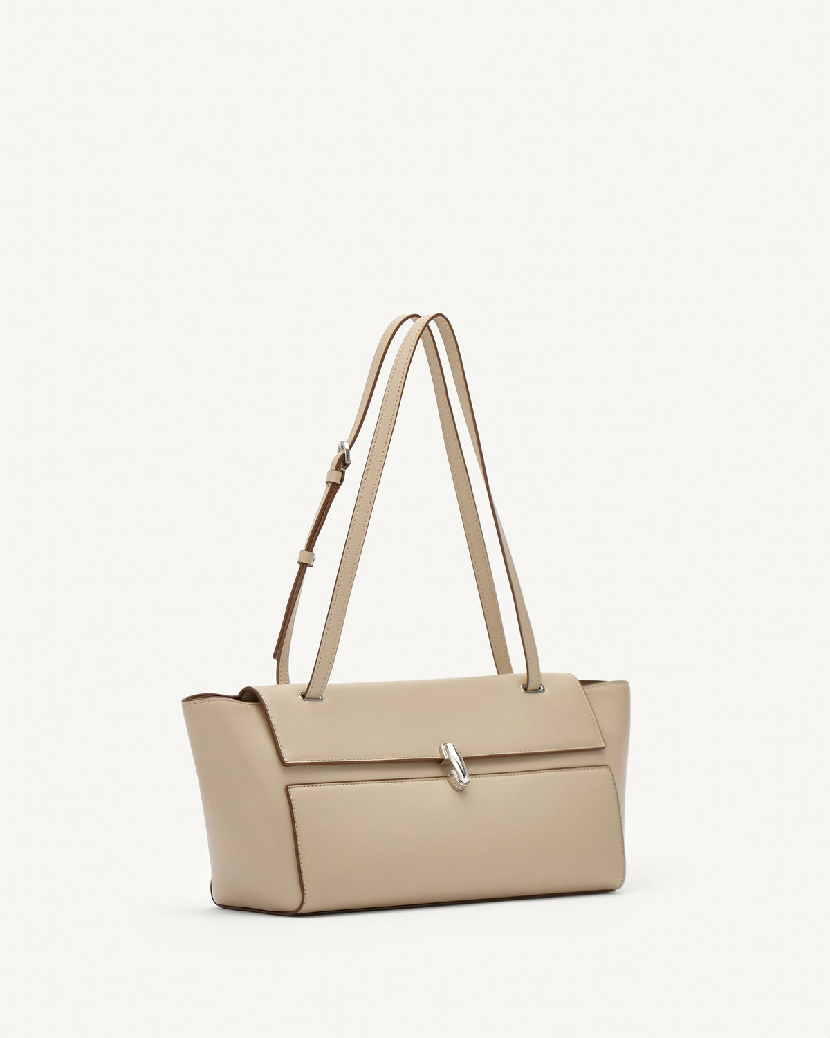 side view of a bone beige leather bag with a silver clasp on a white background