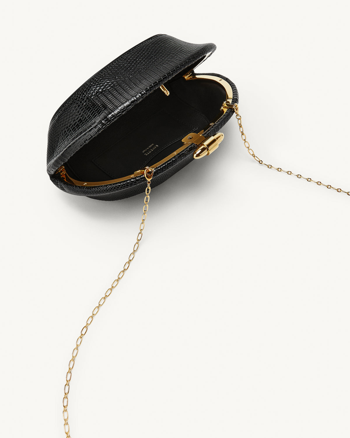 inside view of the Sera Clutch in Black lizard