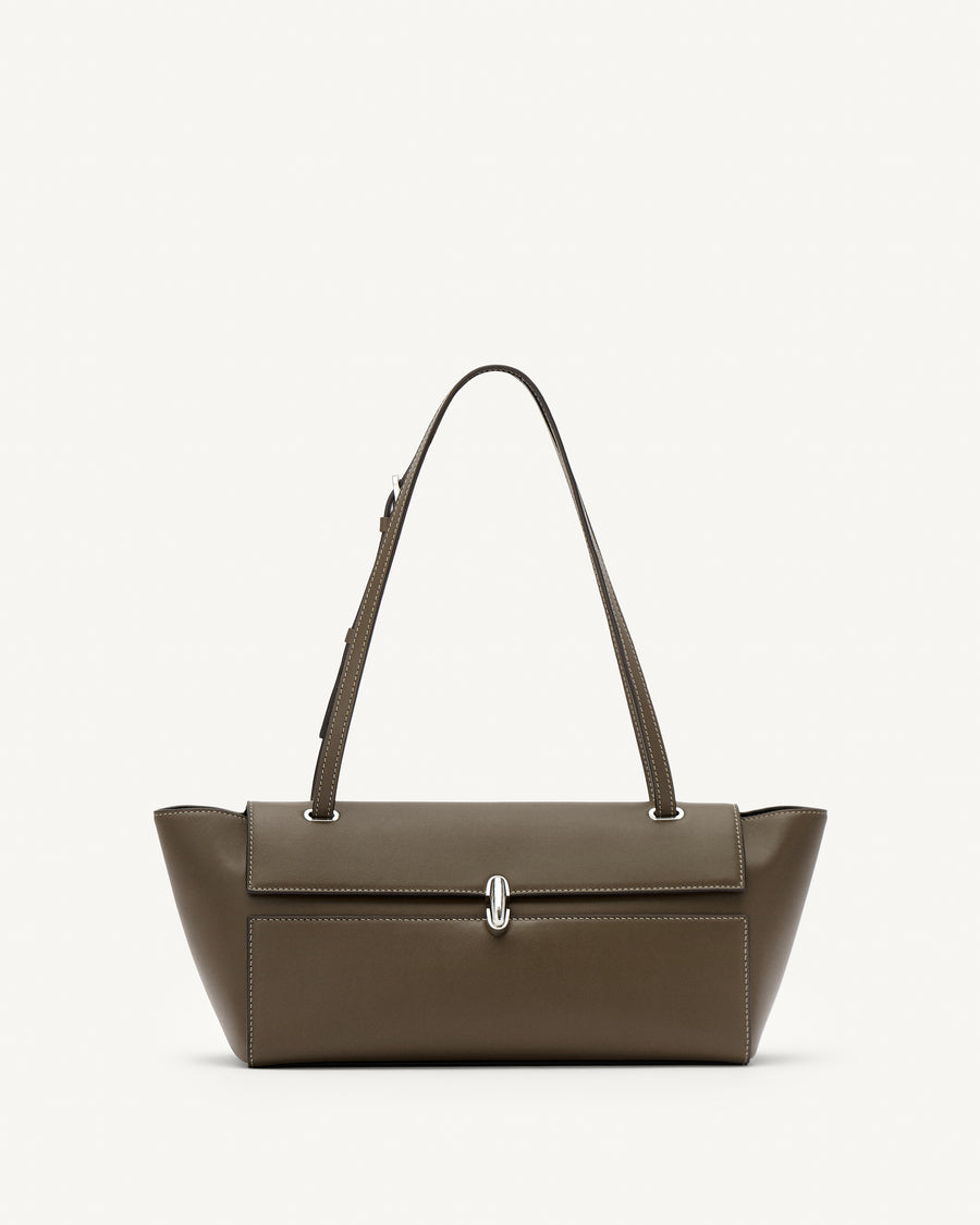 front view of a mink brown leather bag with a silver clasp on a white background