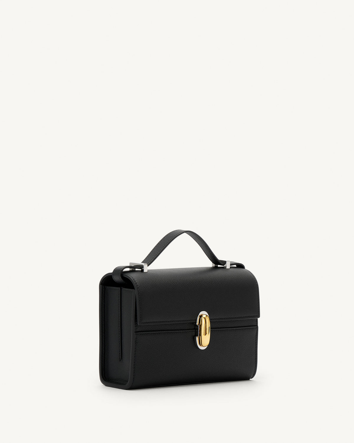 side view of a black leather bag with a silver and gold clasp on a white background