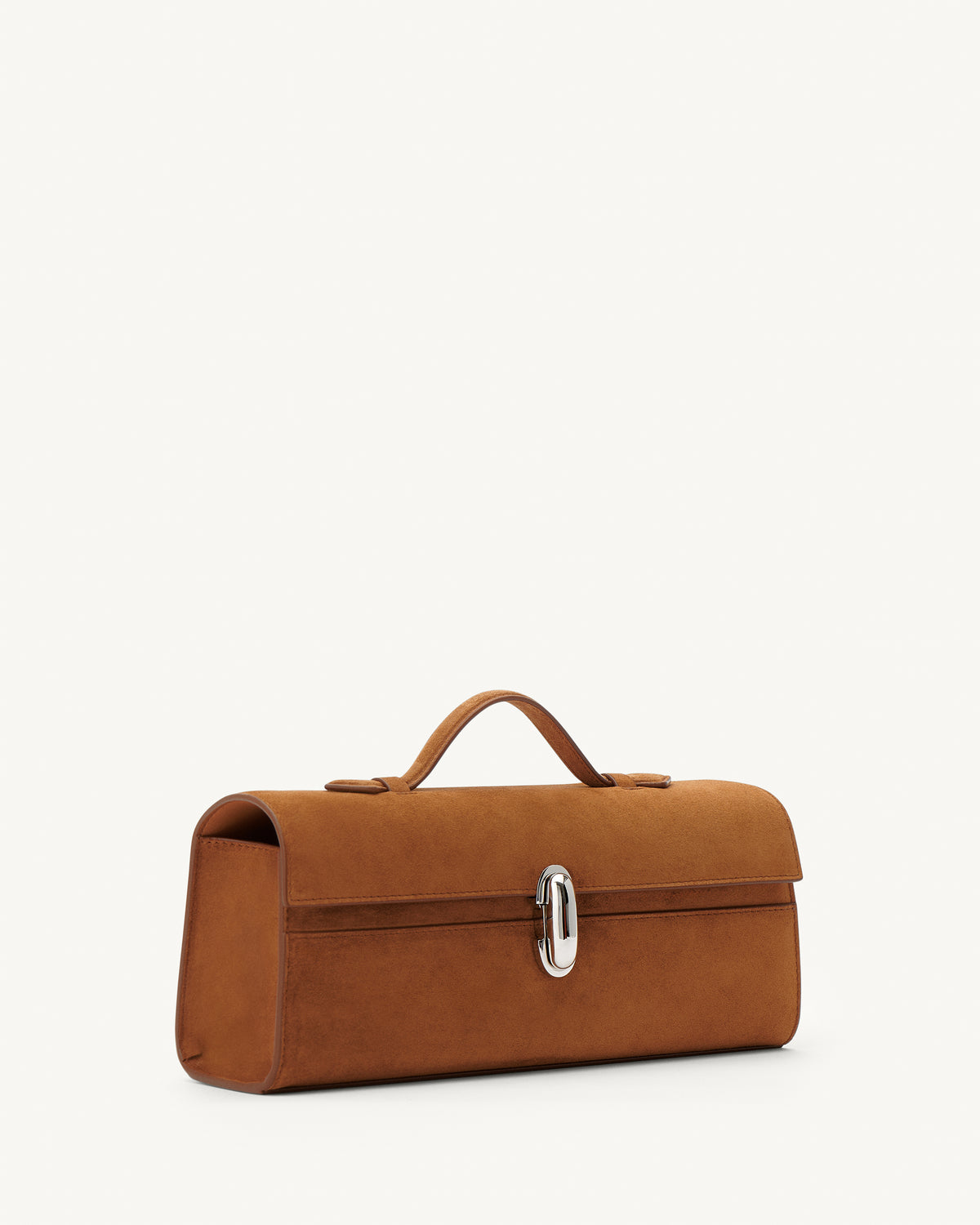 side view of a cognac brown suede top handle bag with a silver clasp on a white background 