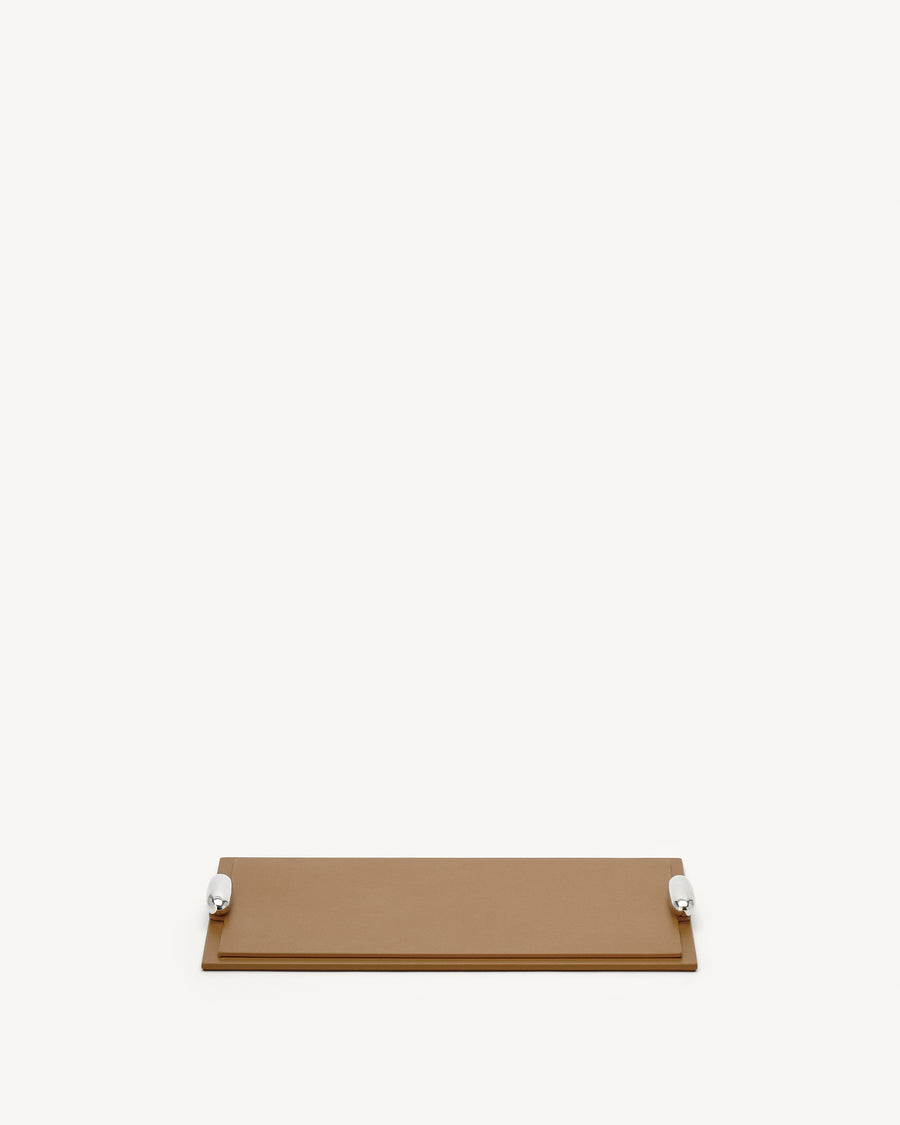 front view of a saddle brown leather tray with silver hardware on a white background