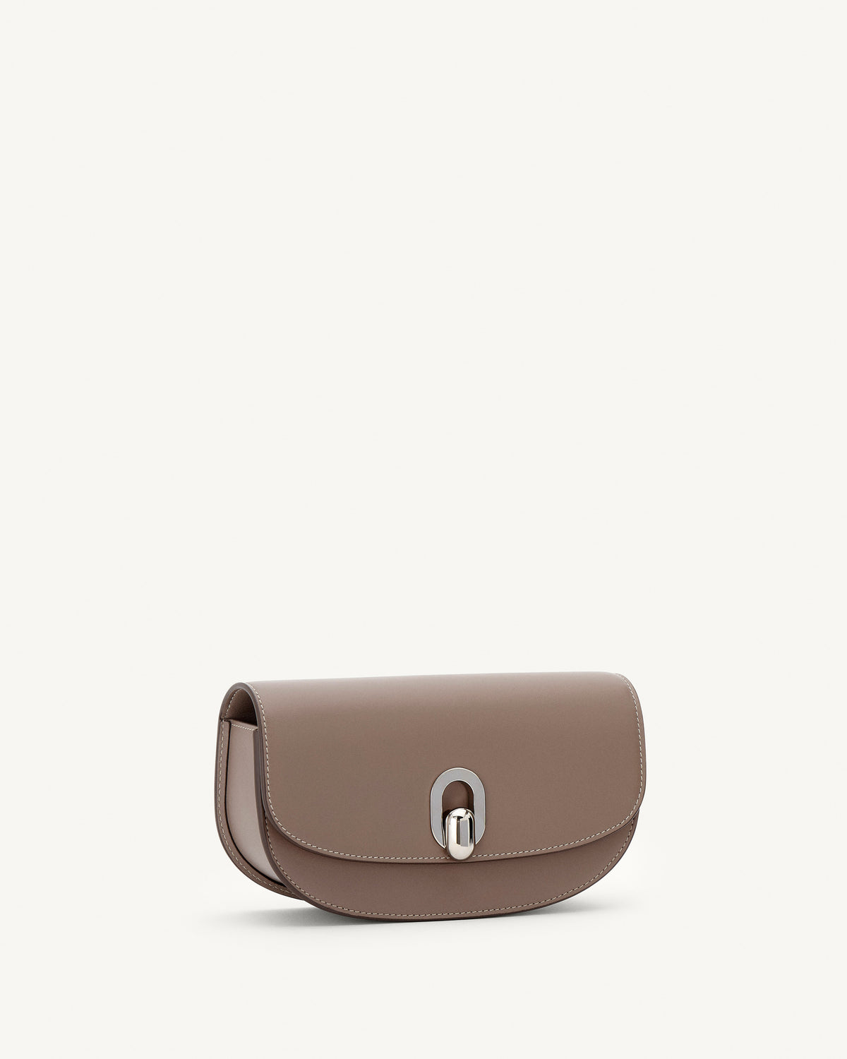 side view of a taupe brown leather bag with silver hardware on a white background