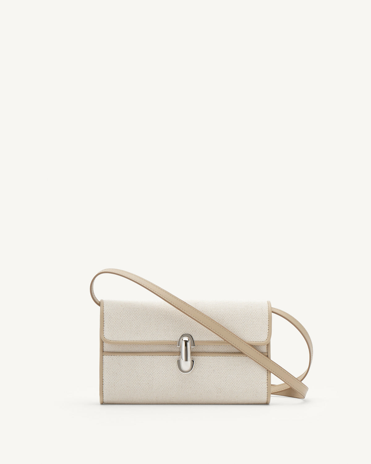 Front view of white canvas crossbody with silver hardware