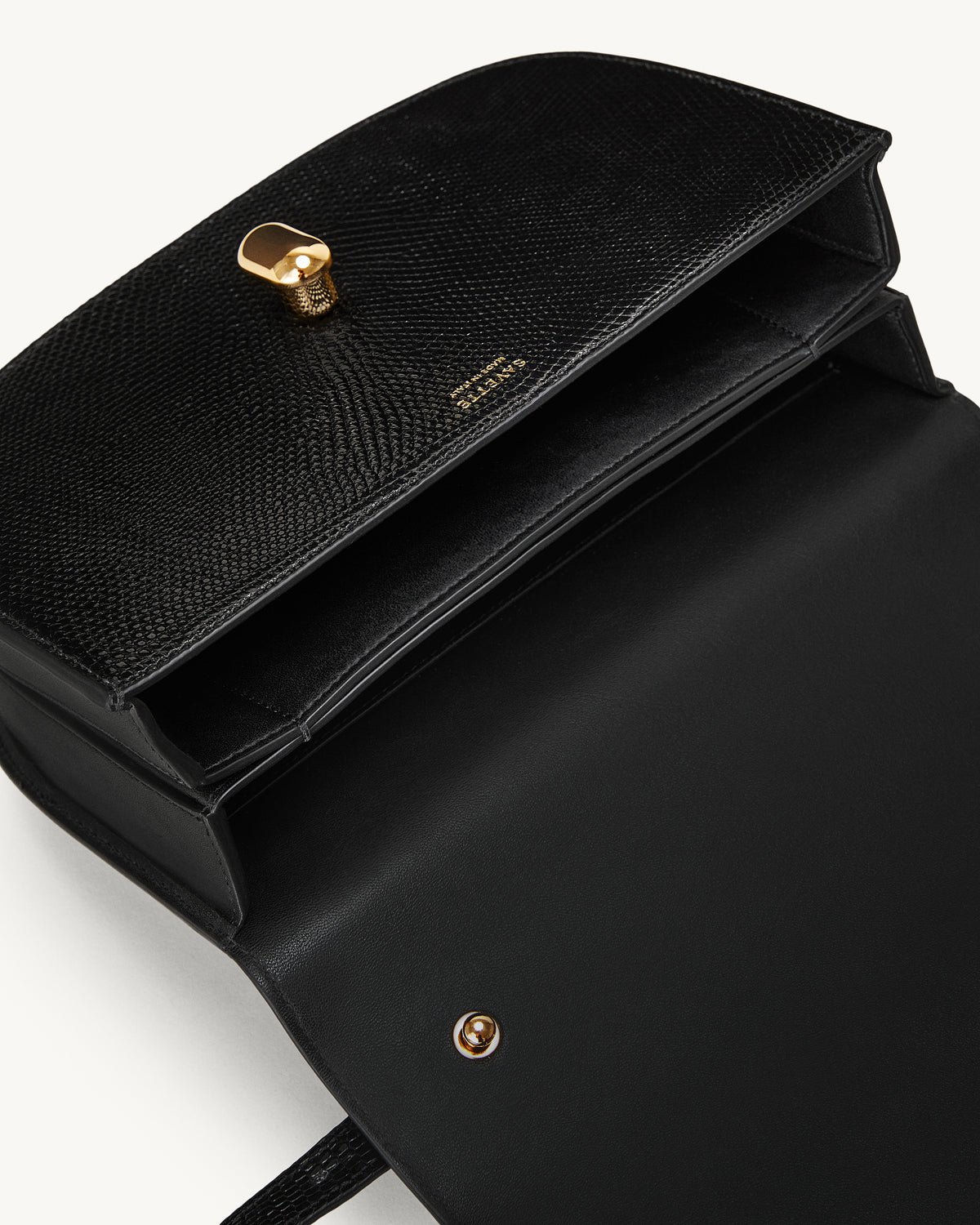 inside view of the Tondo 22 handbag in Black lizard