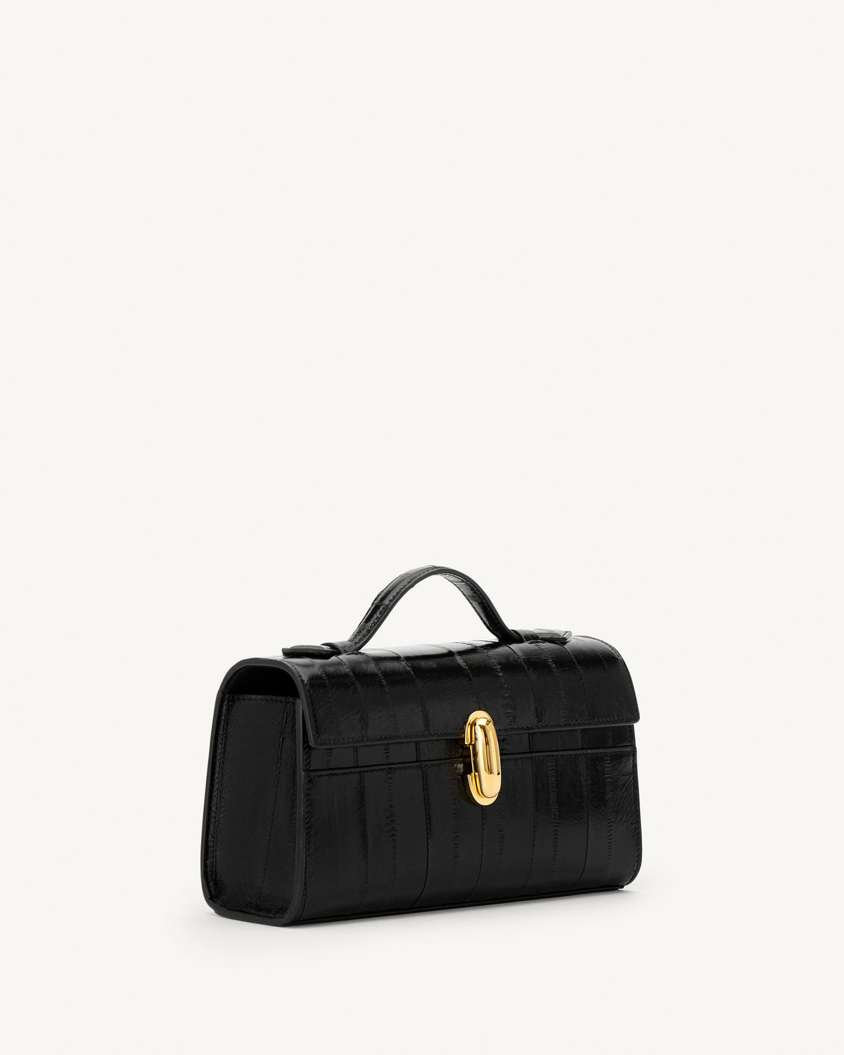 side view of a black eel bag with a gold clasp on a white background