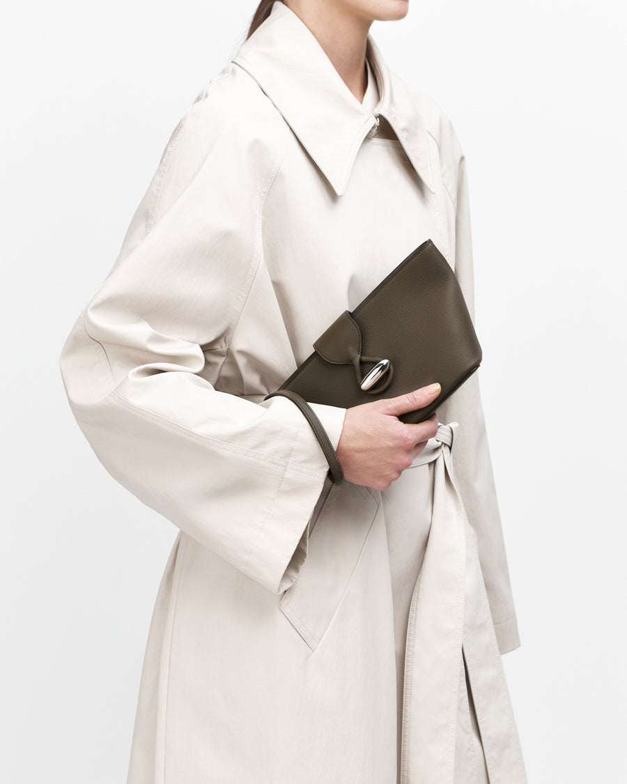 On model view of mink leather pouch with silver hardware
