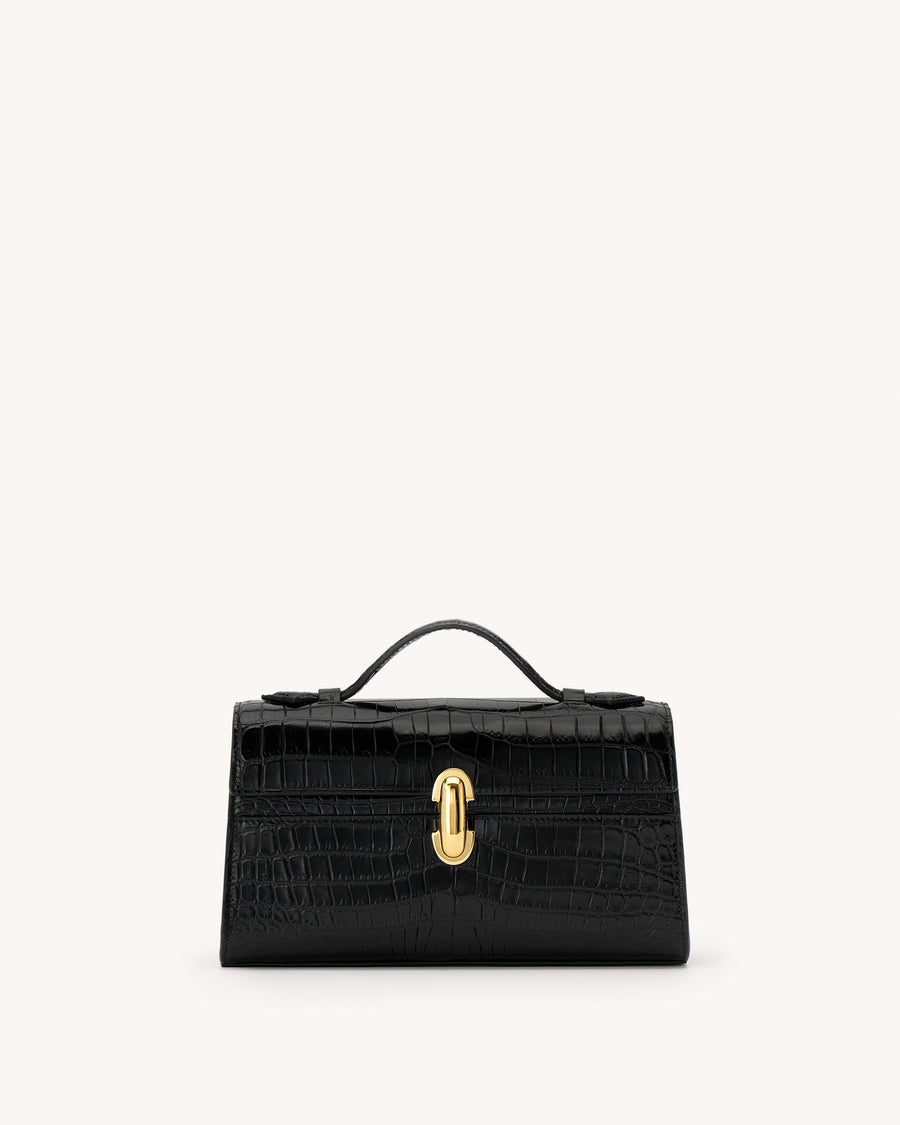 Black handbag with a gold clasp on a white background