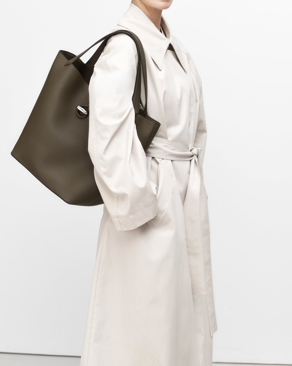 On model view of mink leather tote bag with silver hardware