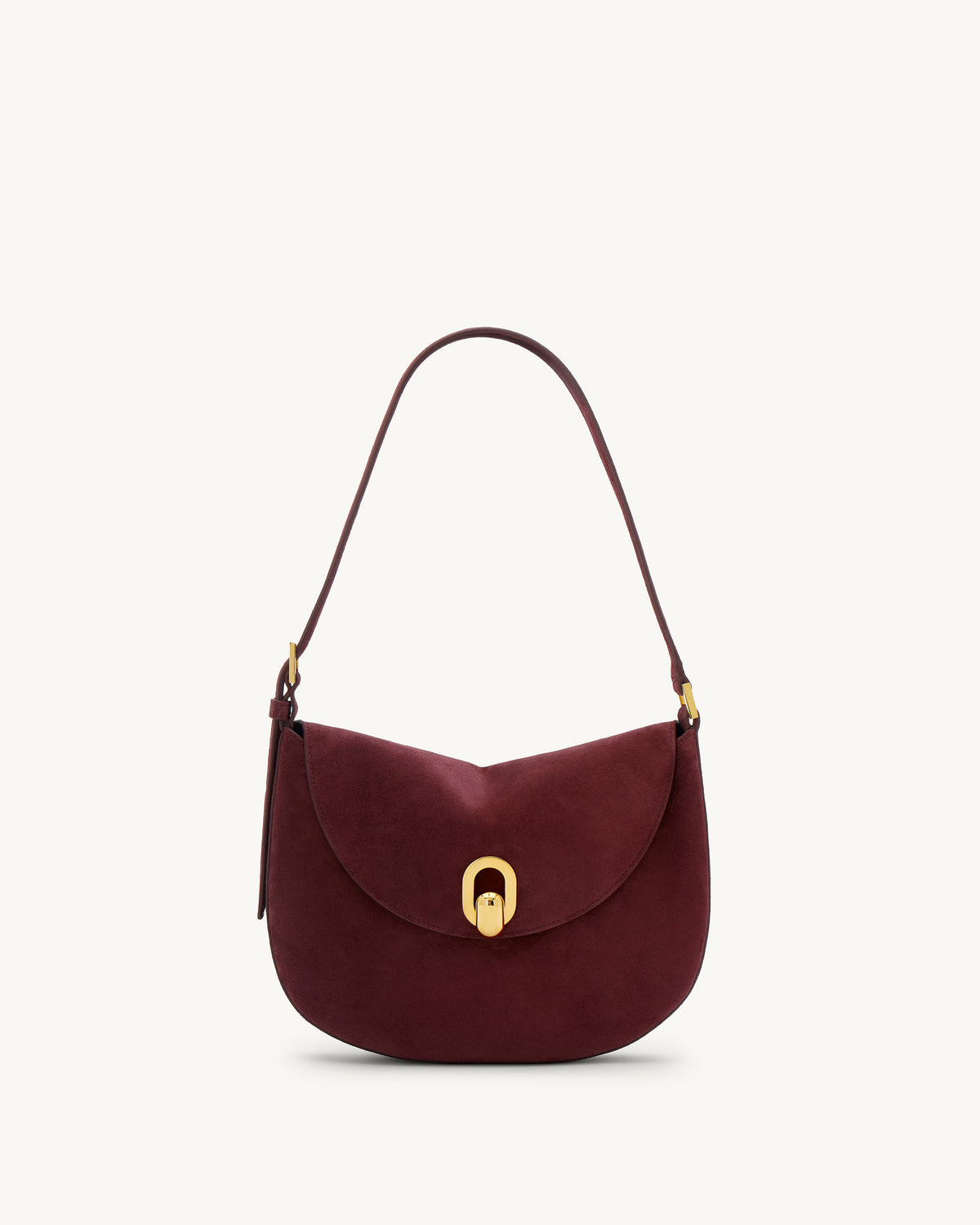 front view of a plum red suede bag with gold hardware on a white background