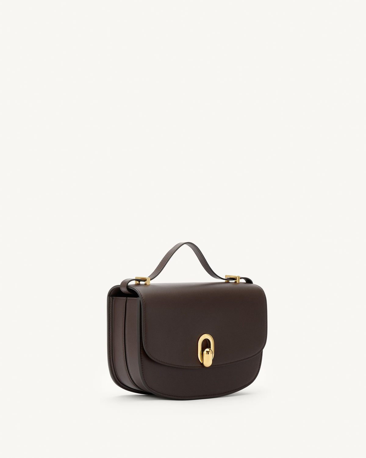 side view of a coffee brown leather bag with gold hardware on a white background