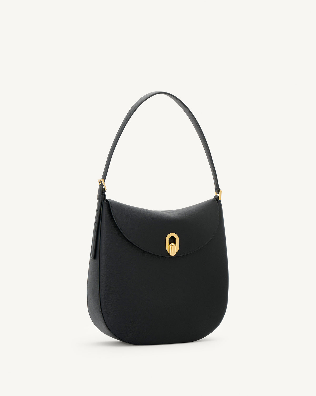 side view of a black leather bag with gold hardware on a white background