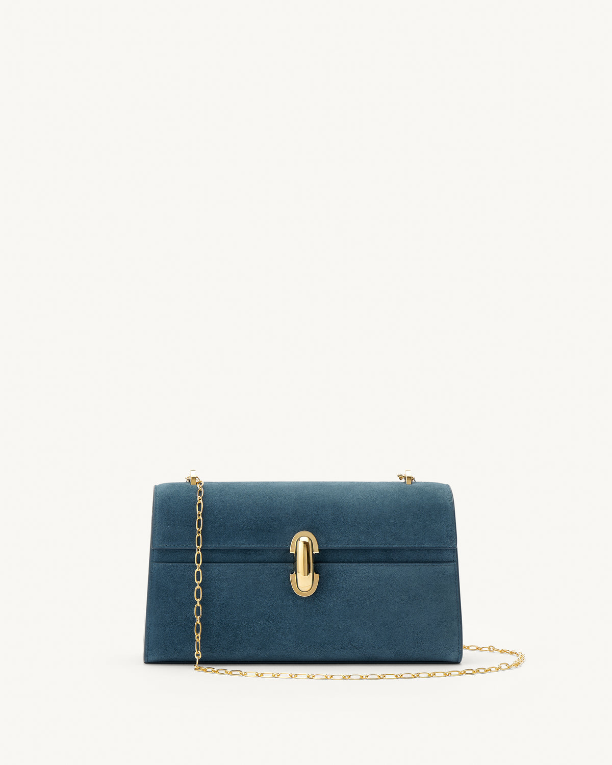 front view of a baltic blue suede handbag with a gold clasp and gold chain on a white background 