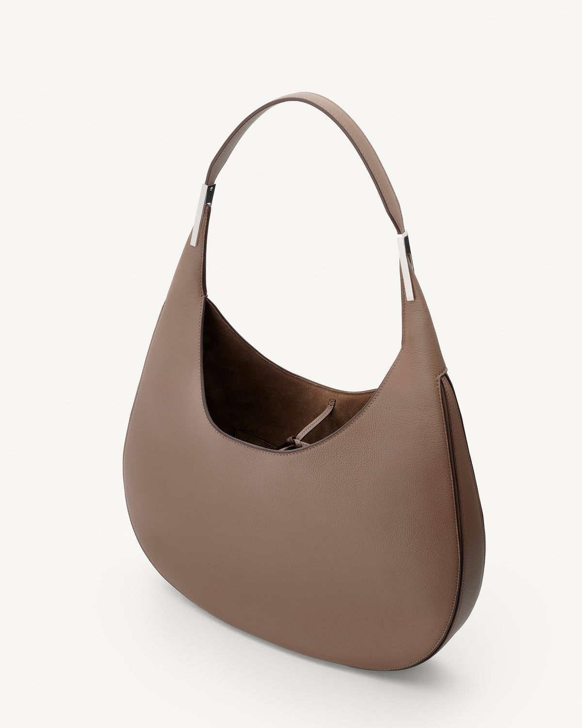 interior view of a taupe brown bag with silver hardware on a white background