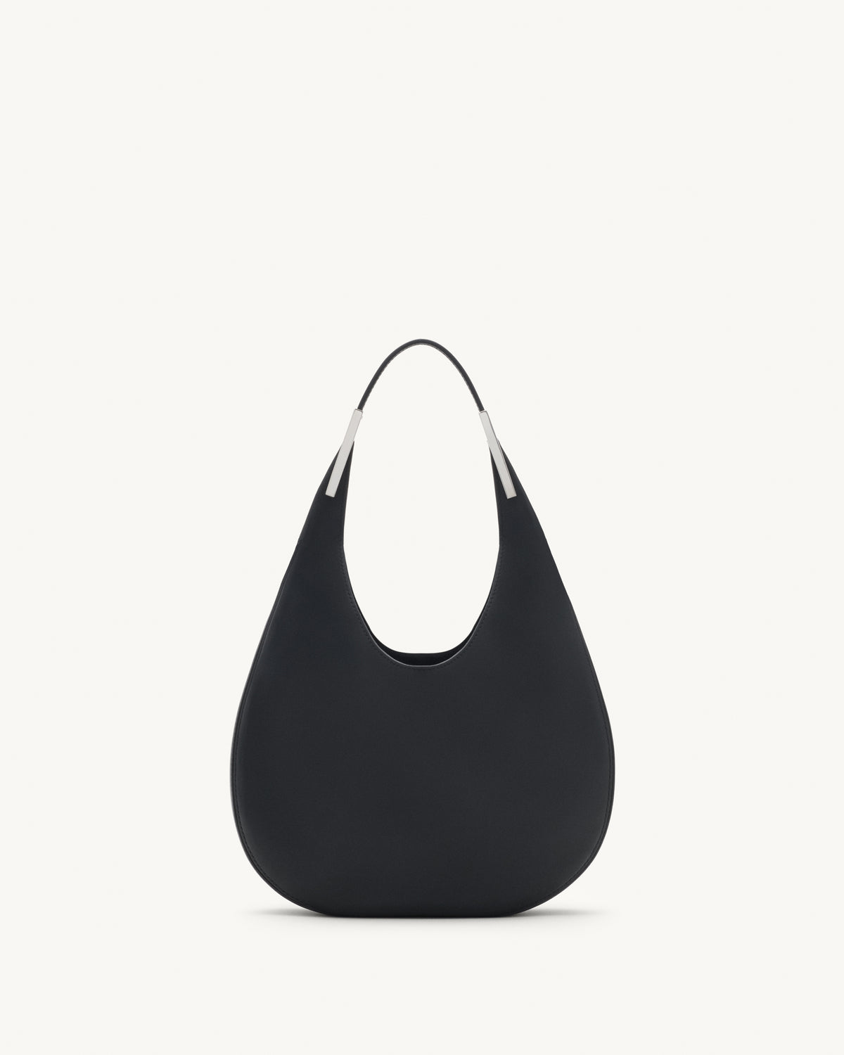 front view of black bag with silver hardware on a white background