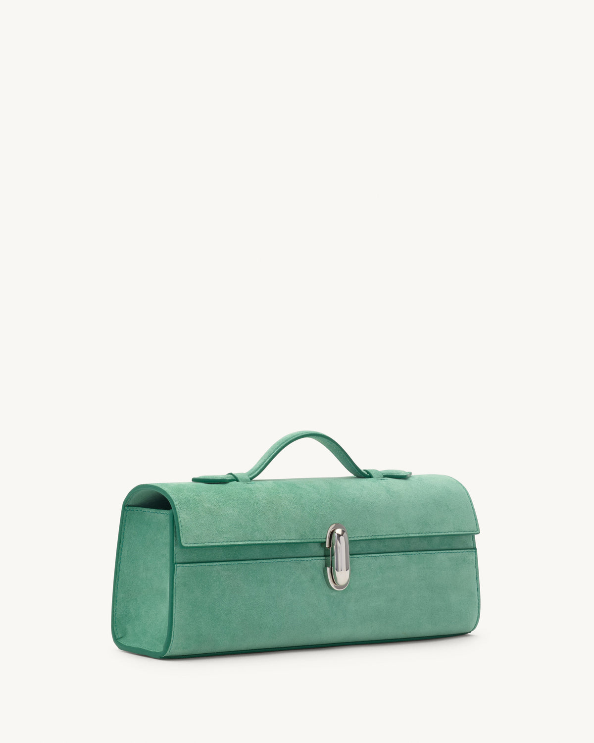 side view of jade green suede bag with silver clasp on a white background