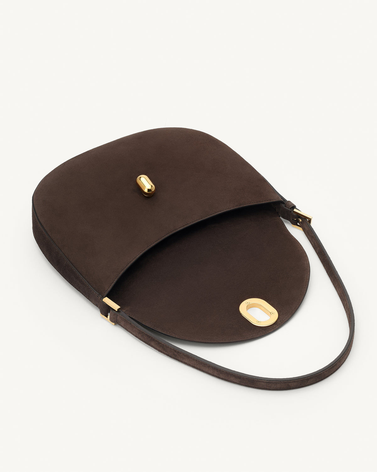 interior view of a coffee brown suede shoulder bag with gold hardware on a white background