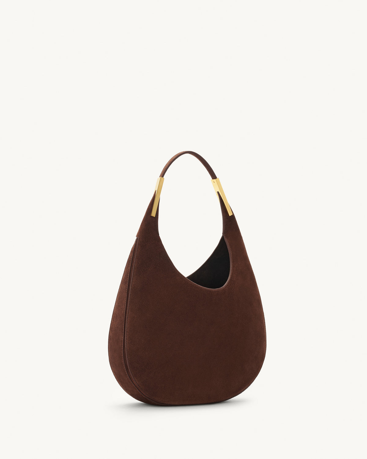 side view of espresso brown suede bag with gold hardware on a white background