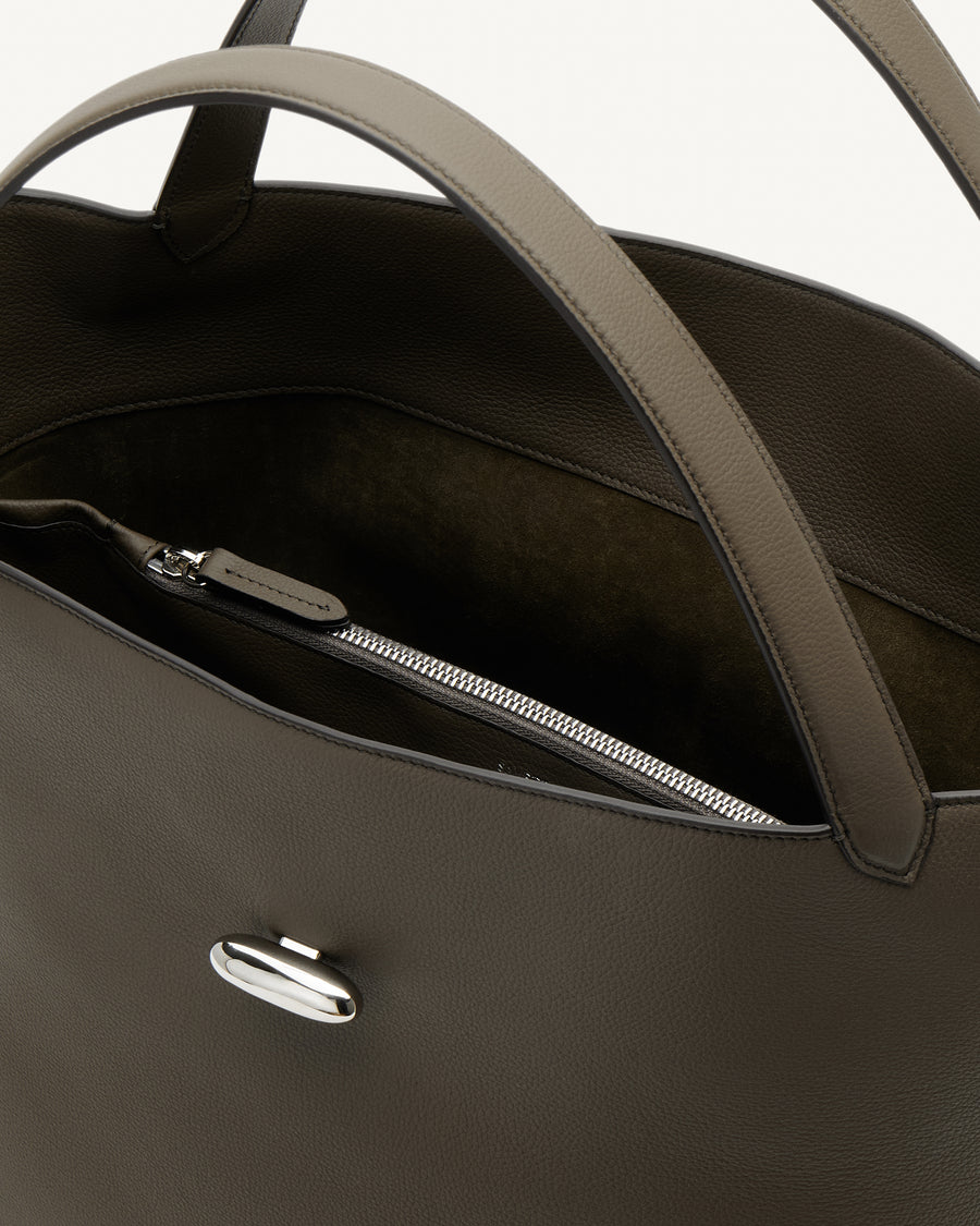 Inside view of mink leather tote bag with silver hardware