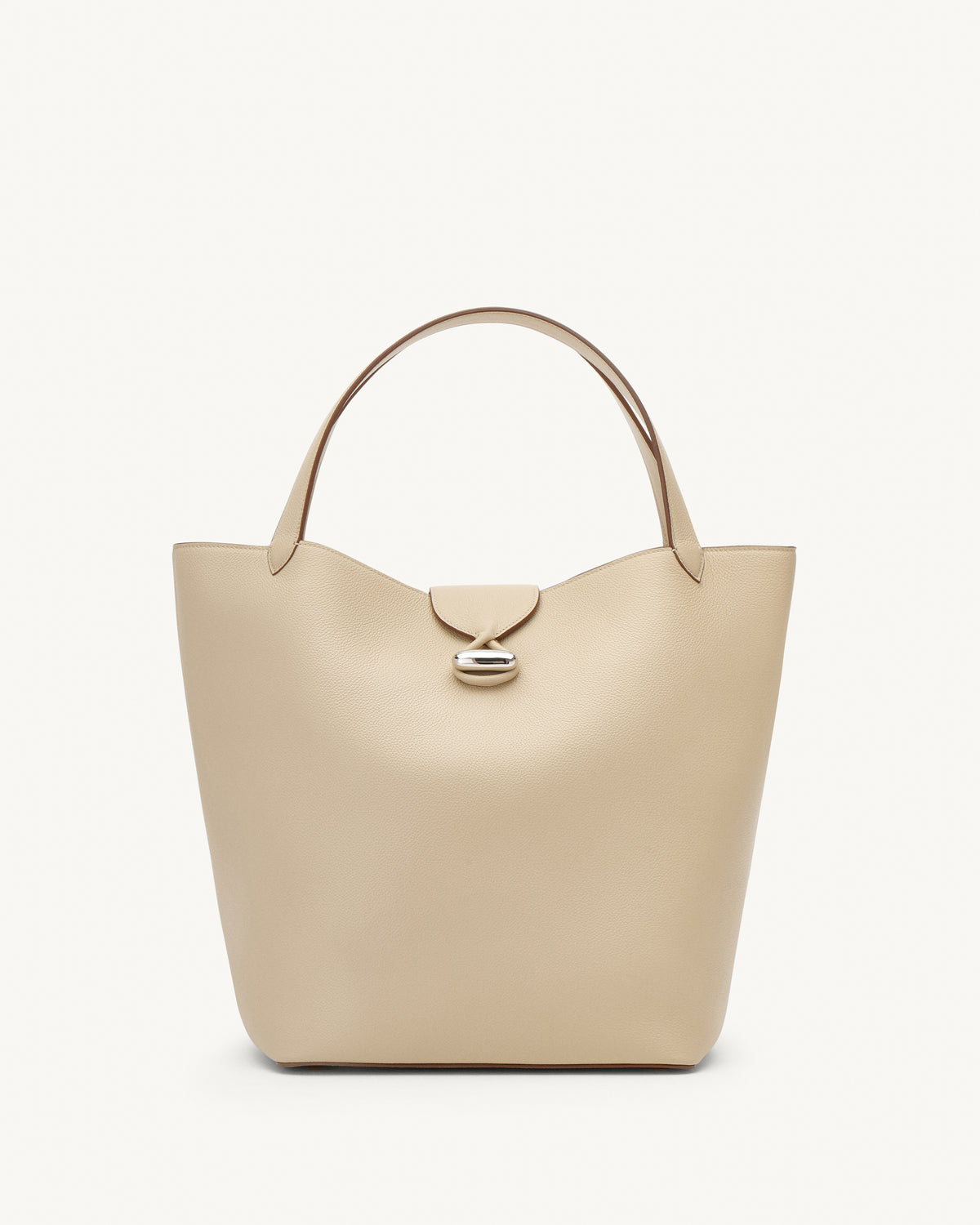 front view of a bone beige bag with silver hardware on a white background