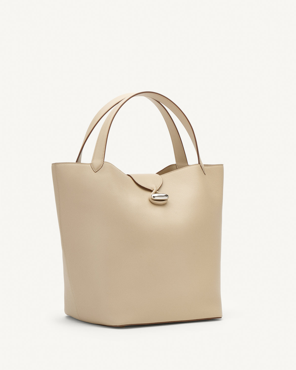 side view of a bone beige bag with silver hardware on a white background