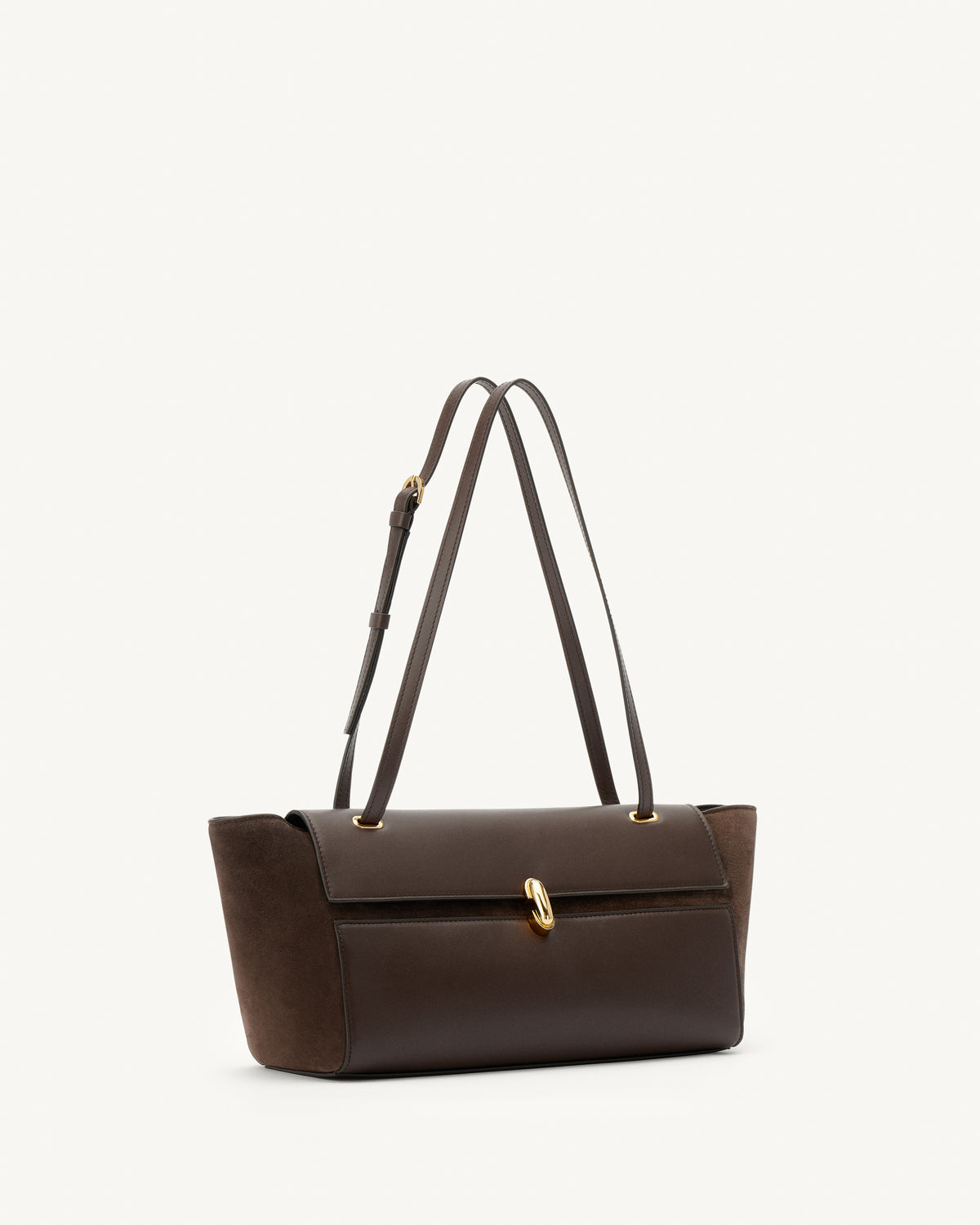 side view of a coffee brown smooth and suede leather shoulder bag with a gold clasp on a white background