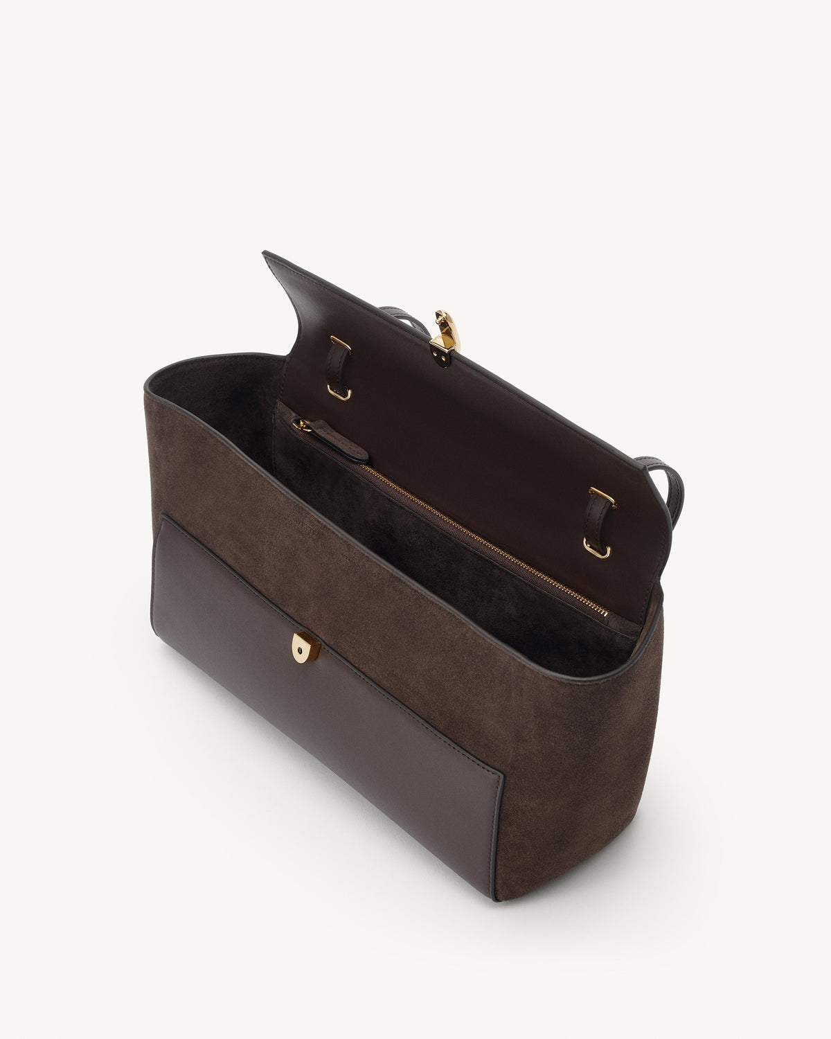 interior view of a coffee brown smooth and suede leather shoulder bag with a gold clasp on a white background