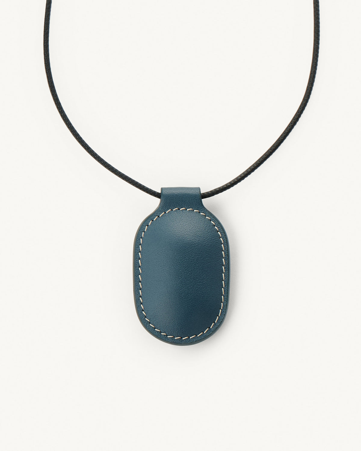 Blue oval pendant on a black cord against a white background
