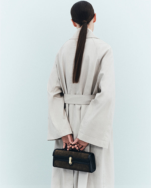 on model image of mink brown bag from behind