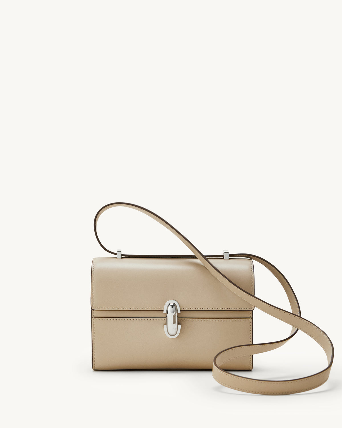 front view of bone beige bag with silver clasp on a white background