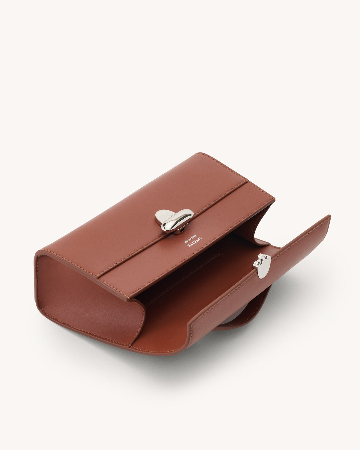 Inside view of the Symmetry Pochette Handbag in Maple Leather 