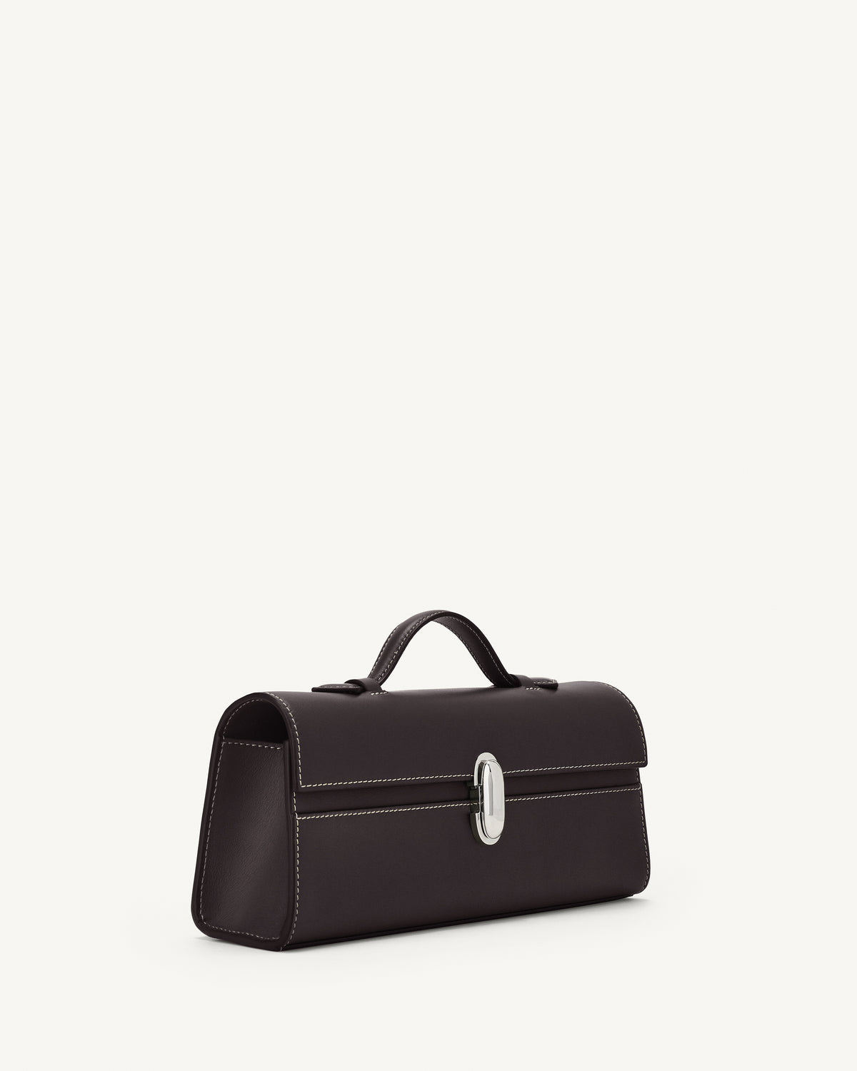 side view of a currant brown bag with silver clasp on a white background